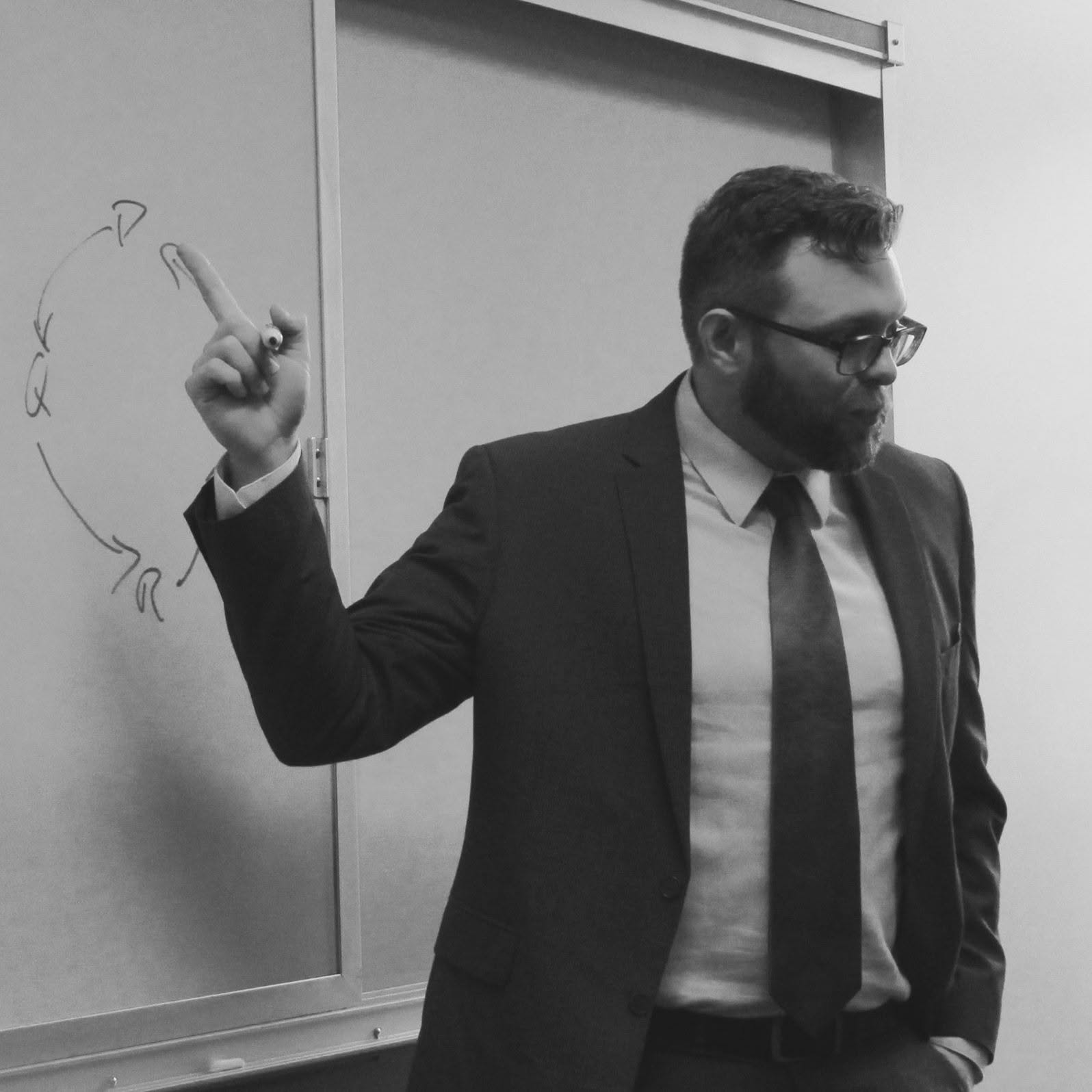 Ian Church speaking in a classroom